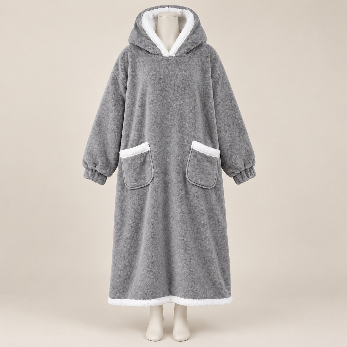 Cocon Polaire XXL présenté sur mannequin, fond beige