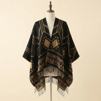 Poncho Himalaya Franges – coloris Noir et or, présenté sur mannequin couture